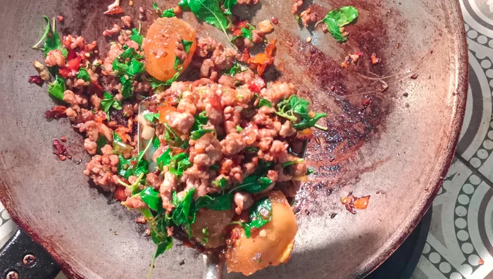 Add the fried century egg halves and stir to combine.