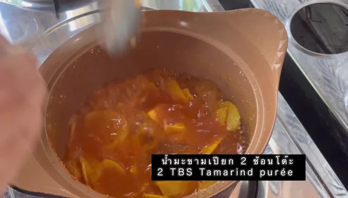 Season with tamarind juice and fish sauce to taste.