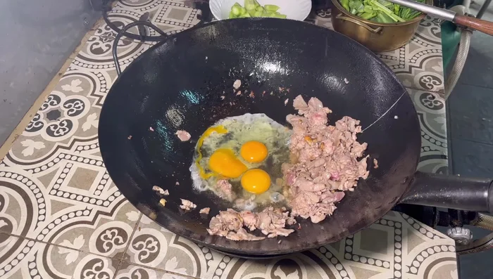 Add eggs and scramble them.