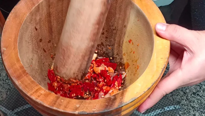 Heat oil in a wok or large frying pan over medium-high heat.