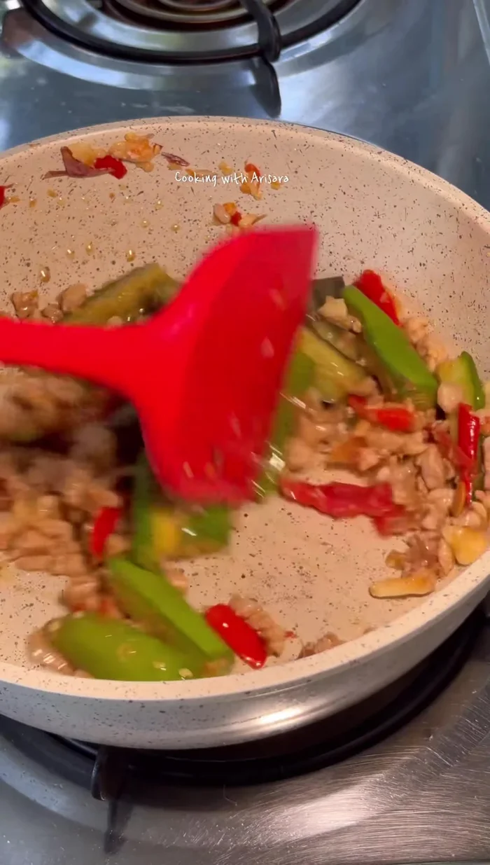 Add eggplant and stir-fry until softened.