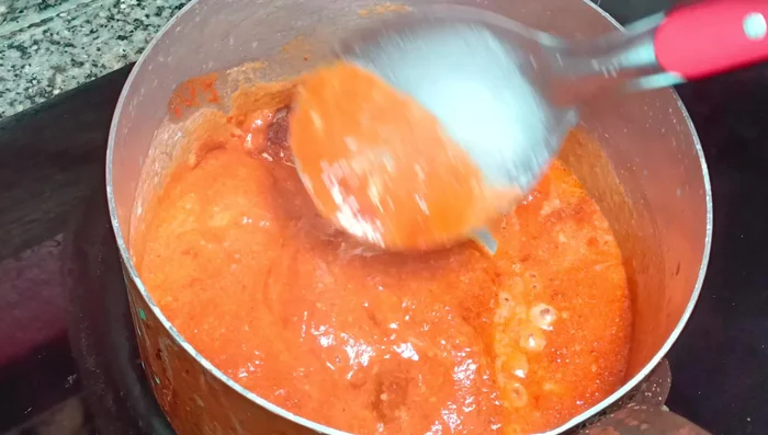 Add the red curry paste and stir well to combine.