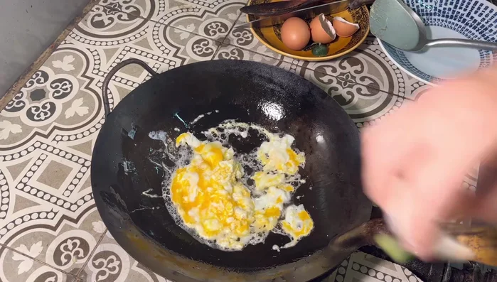 Add onions and stir-fry.