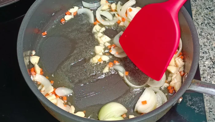 Add garlic and cook until yellow.