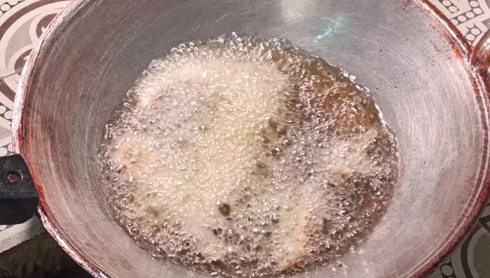 Gradually add the fish to the pan, one at a time, ensuring they don't clump together. (87.479)