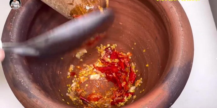 Add the pork belly and stir-fry until browned and slightly crispy.