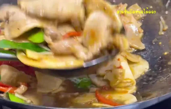 Prepare the ingredients: Wash and chop the fermented bamboo shoots, pork belly, garlic, and chili (if using).