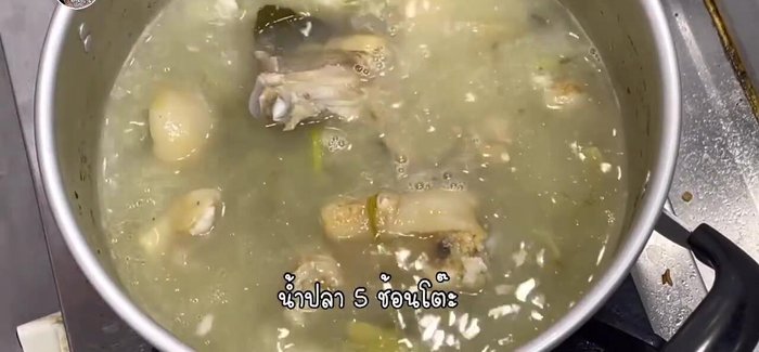 Add the pork knuckle to the broth and simmer until tender.