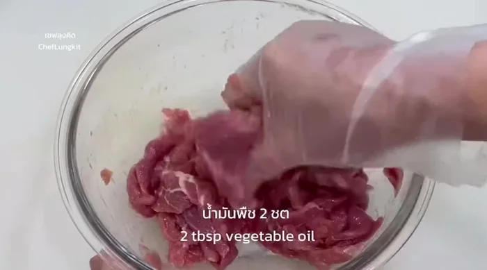 Heat the cooking oil in a frying pan over medium-high heat.