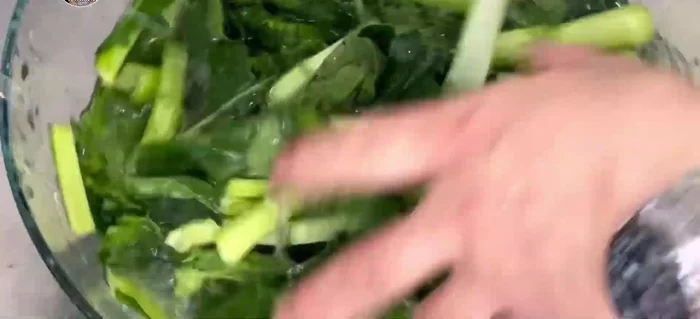 Continue cooking, likely adding ingredients and/or water
