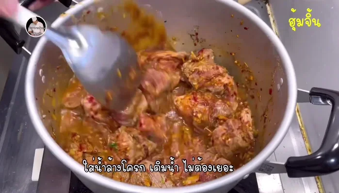 Start cooking the ingredients. Add pork, ginger, garlic, chilies, and vegetables in a pot and start cooking.