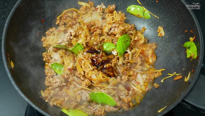 Increase the heat to high and stir-fry until all the seasonings are well incorporated.