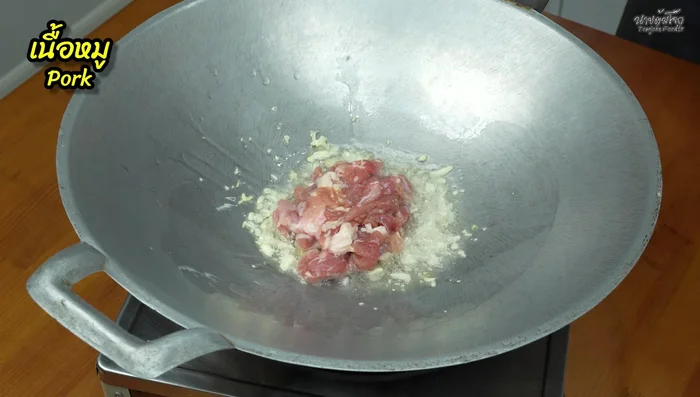 Add pork and stir-fry until cooked. (185.959)