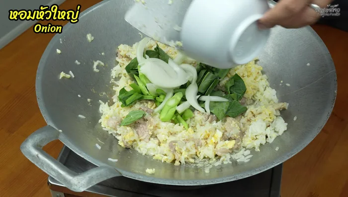Add kale and other vegetables, stir-frying until wilted. (291.16)