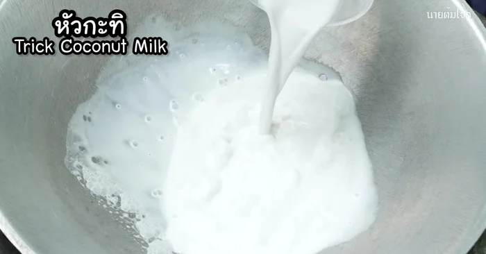 Put coconut milk in a pot and bring to a boil.