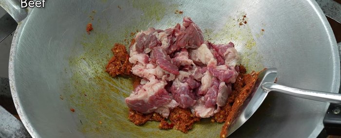 Add the beef and stir-fry until cooked. The curry paste recipe is available on the channel.