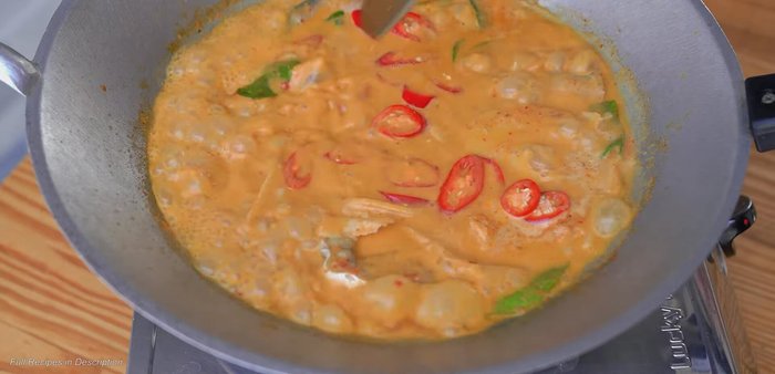 Simmer until heated through. Garnish with chili peppers. (324.3)