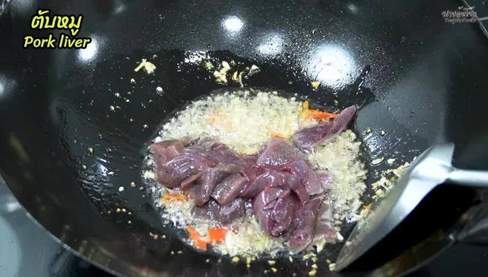 Add the pork liver and stir-fry until almost cooked.