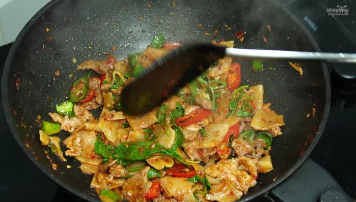 Remove from heat and serve hot with rice.
