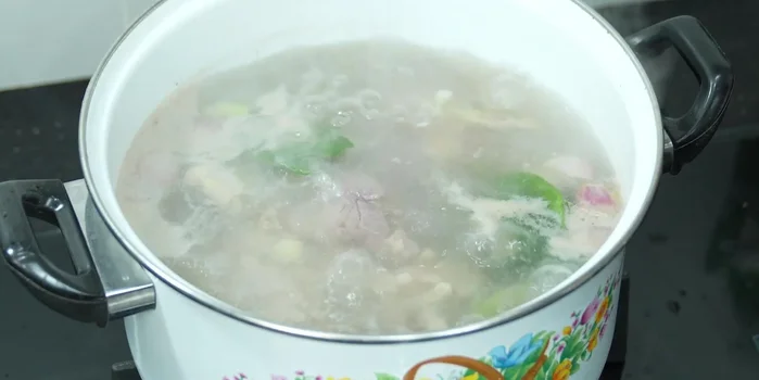 Add the chicken giblets. Skim off any foam or impurities that rise to the surface.