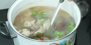Spicy Chicken Soup with Fermented Fish Sauce (Thai Style)