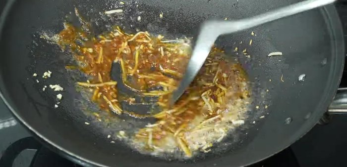 Add water and bring to a boil, stirring constantly.