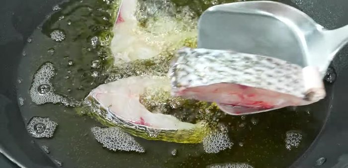 Heat up a pan with oil until hot. Fry the tilapia over medium heat until crispy, flipping once when it starts to cook. Drain and set aside to cool.