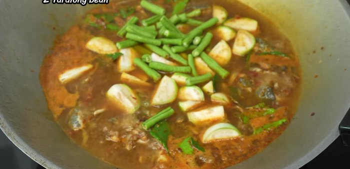 Add green beans and young corn.