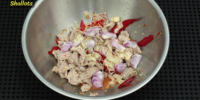 Add chopped lemongrass, and optionally, more shallots, garlic, or Chinese celery. Mix.