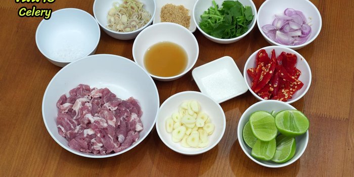 Prepare the dressing: Mix sugar, fish sauce powder (optional), freshly squeezed lime juice, pounded chili, and chopped shallots (or celery).
