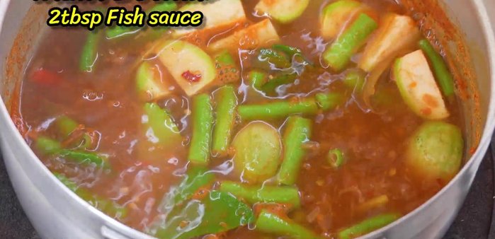 Add seasoning powder and fish sauce.
