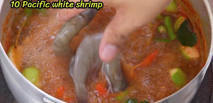 Add shrimp and increase heat. Close the lid for a while.