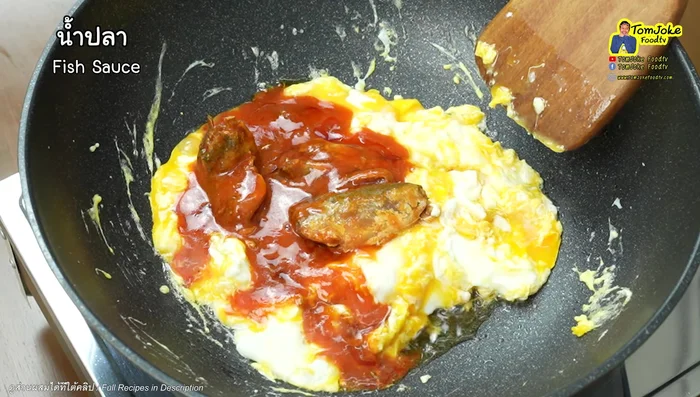 Add the canned fish. You can crush it if you prefer, or leave it whole.