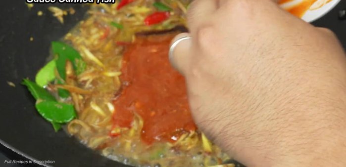 Add the canned fish and mix well.