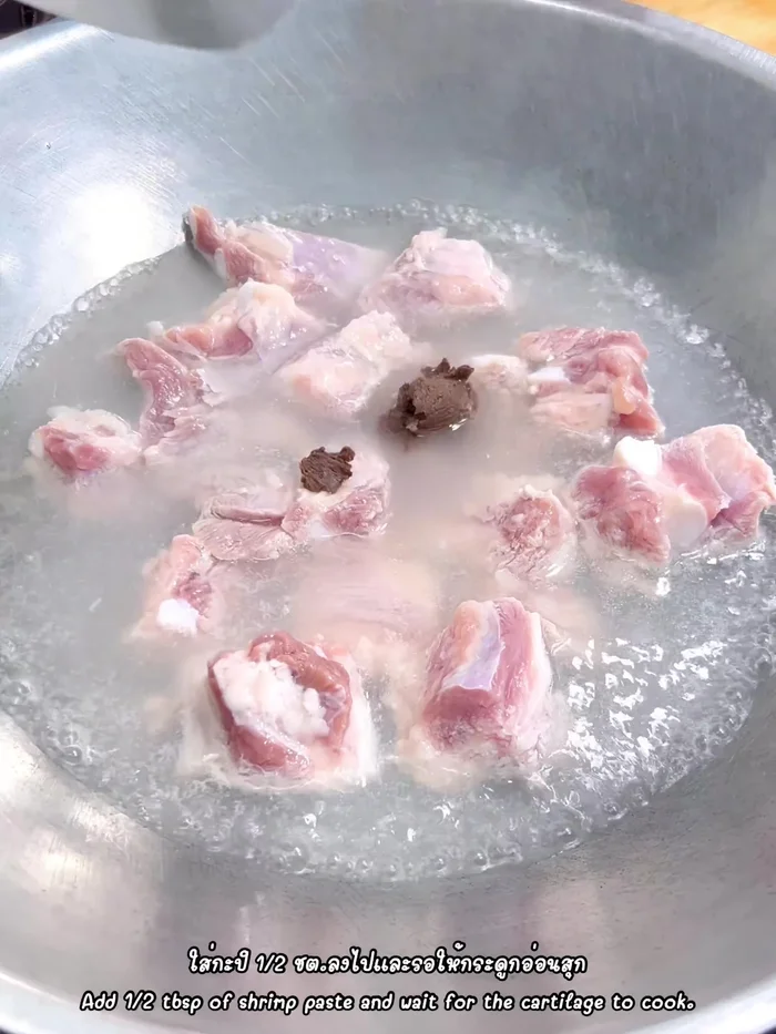 Add half a tablespoon of shrimp paste.