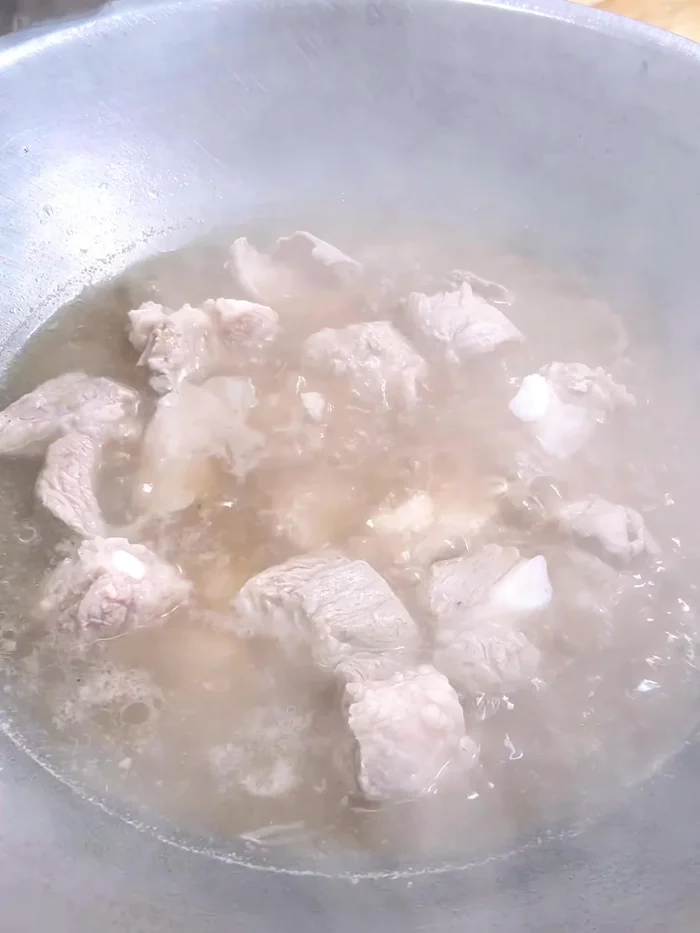 Simmer until the water reduces a bit and the cartilage is cooked through. Stir regularly for even cooking.