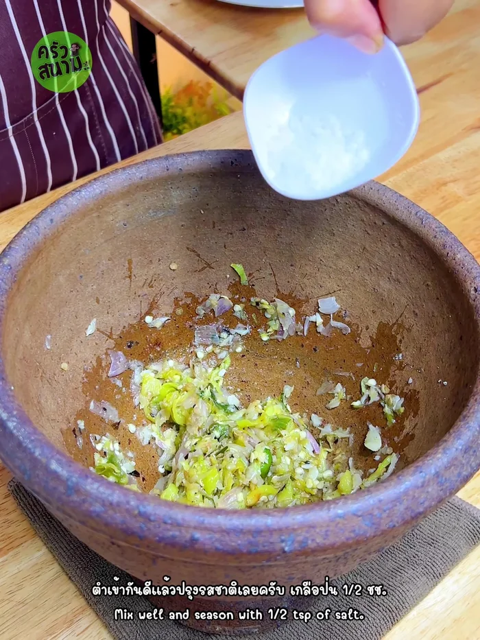 Season with salt, fish sauce, and mix well.
