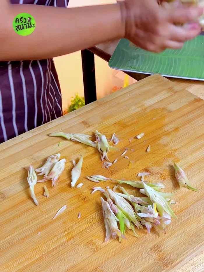 Pound the dried chilies until slightly broken.