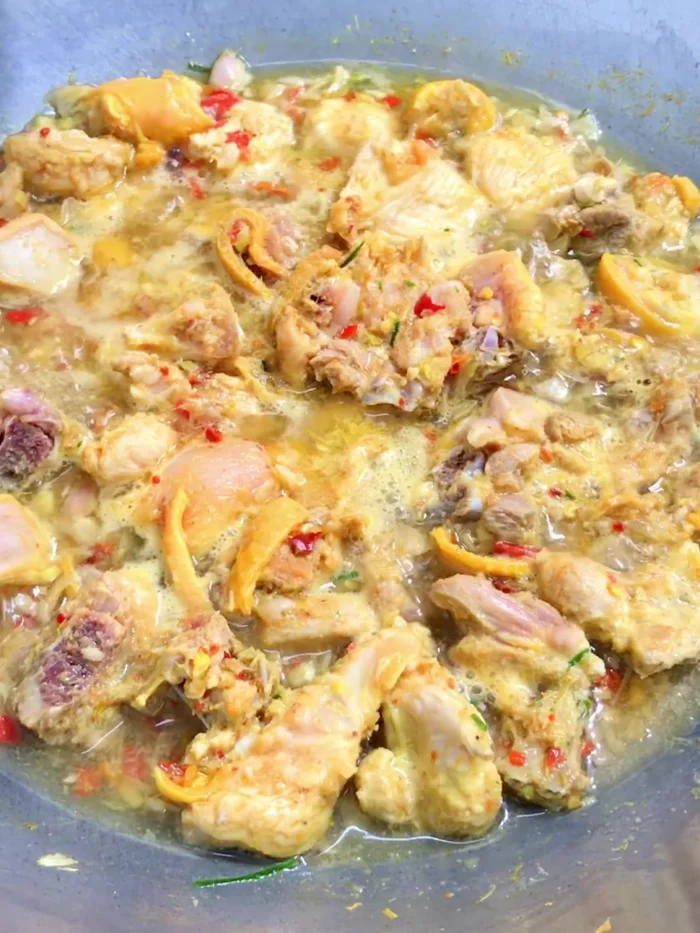 Add fish sauce, boiled fish sauce, and sugar. Stir. Reduce heat to medium-low. (83.2)