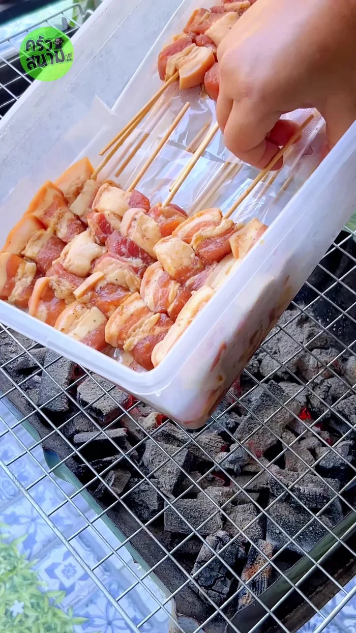 Grill the frozen pork skewers over low heat on a charcoal grill, turning frequently for even cooking. [186.4]