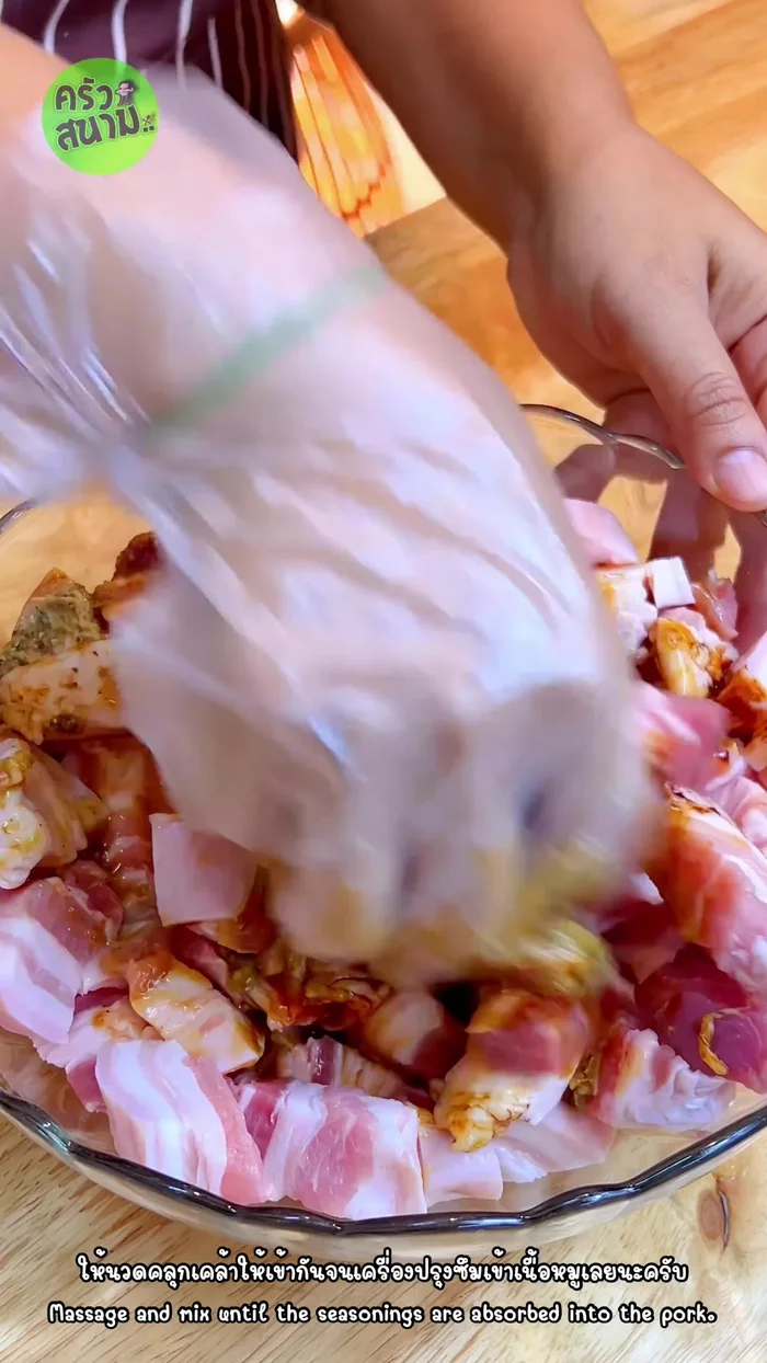 Massage the marinade into the pork. [57.96]