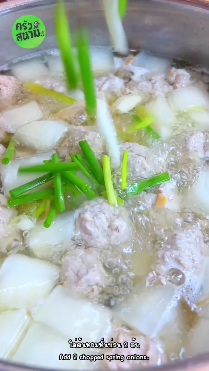 Finally, add 2 chopped spring onions and 1 coriander. Stir gently. Turn off the heat. (206.28)