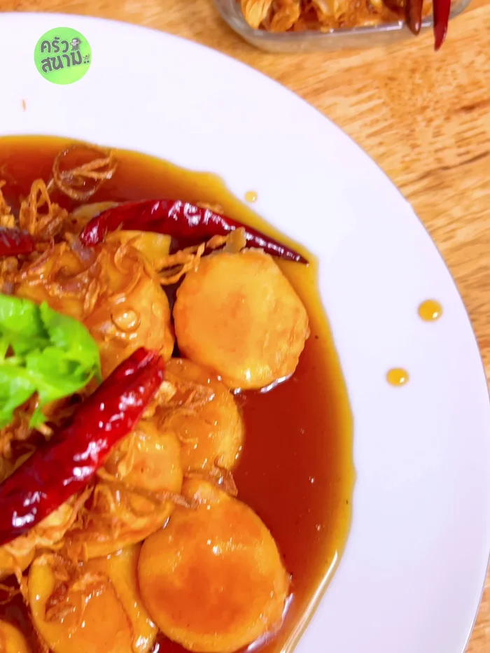 Assemble the dish: Arrange the crispy egg tofu on a plate, top with fried shallots, and drizzle with tamarind sauce.
