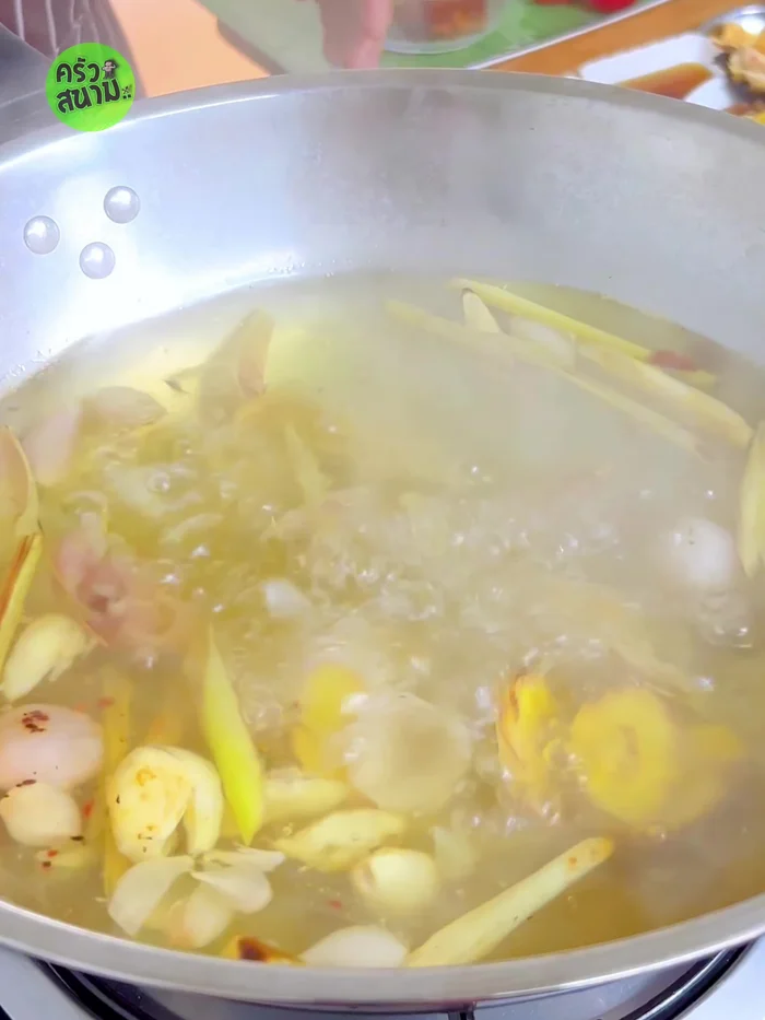 Bring to a boil, then simmer until the herbs are cooked and the soup is flavorful.