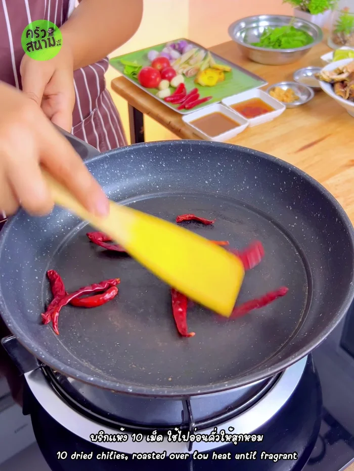 Roast the dried chilies over low heat until fragrant.