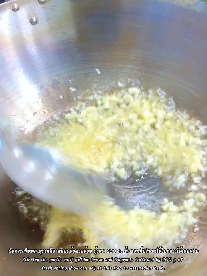 Add the mixed vegetable stir-fry sauce and 1 teaspoon of ground pepper. Stir-fry until well combined (226.799).