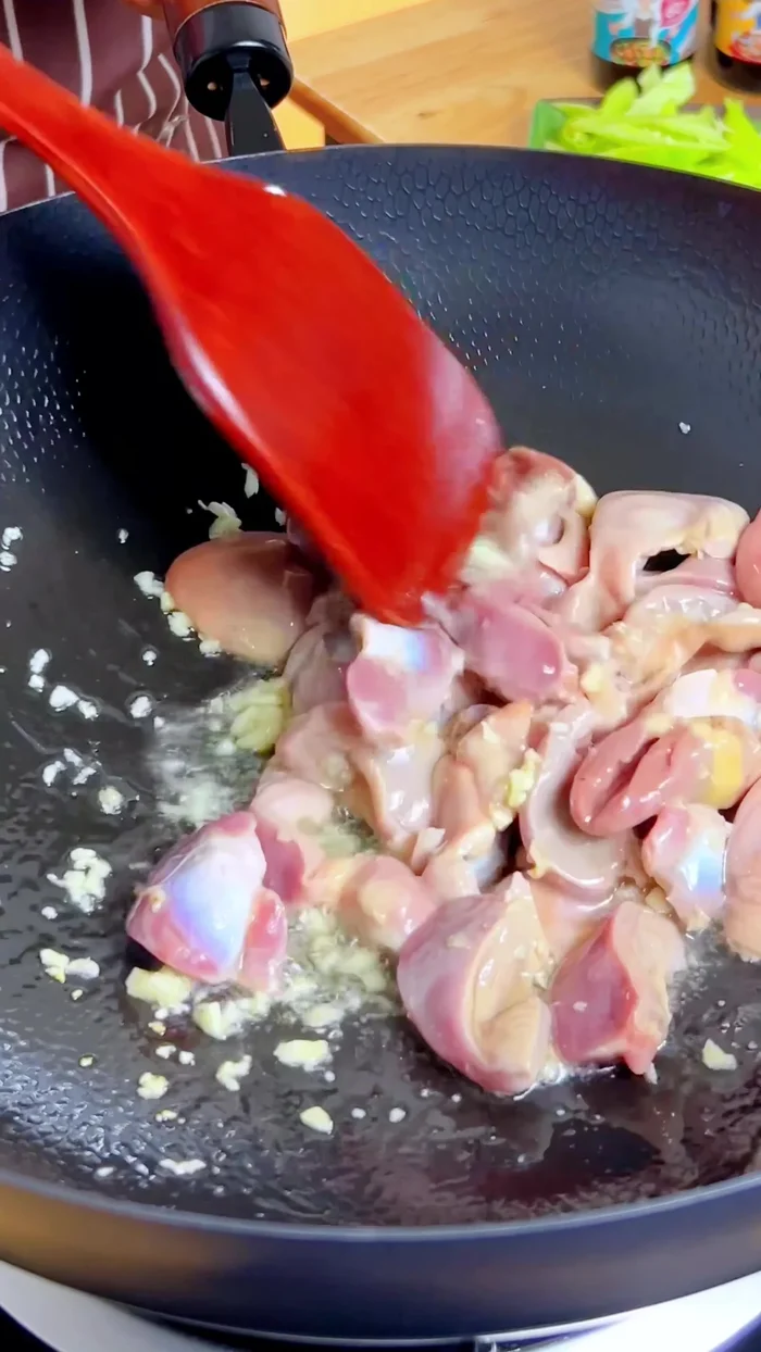 Add chicken gizzards and hearts, stir-fry until cooked.