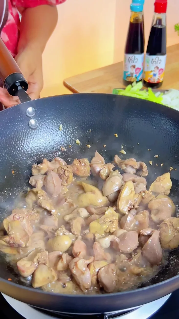 Add bell peppers, onion, and red chili peppers.