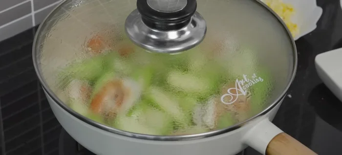 Cover and simmer until the zucchini is cooked through and the sauce has thickened.
