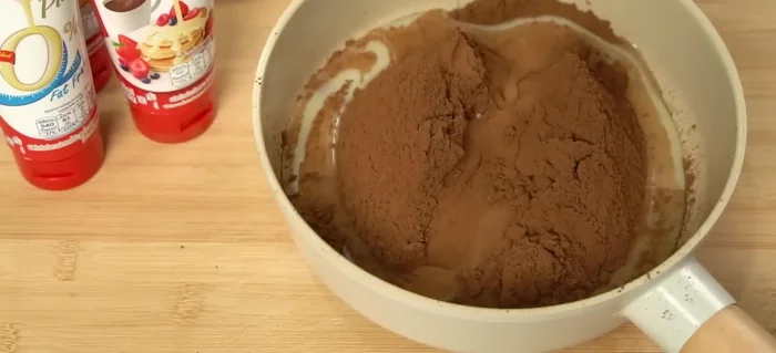 Mix the cocoa and condensed milk thoroughly.